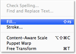 Selecting the Fill command from the Edit menu in the Menu Bar. Image © 2013 Photoshop Essentials.com