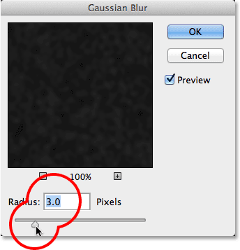 Setting the Radius value in the Gaussian Blur dialog box. Image © 2013 Photoshop Essentials.com