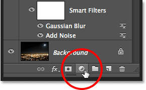 Clicking again on the New Adjustment Layer icon in the Layers panel. Image © 2013 Photoshop Essentials.com